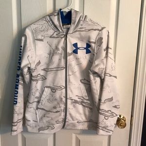 A zip up under armor jacket